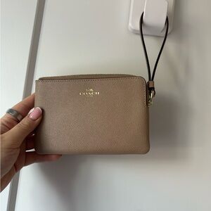 Coach Beige Wristlet with Black Strap